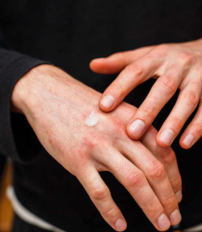 Applying lotion to hands