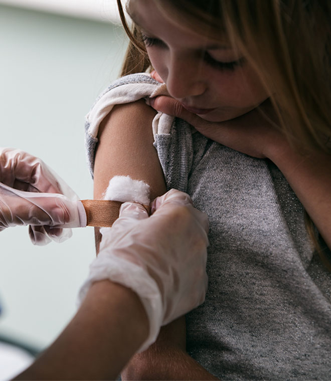 Young white girl getting flu shot