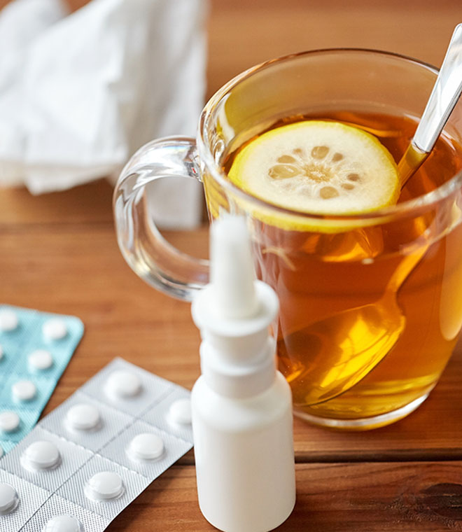 Medications and drink on a table