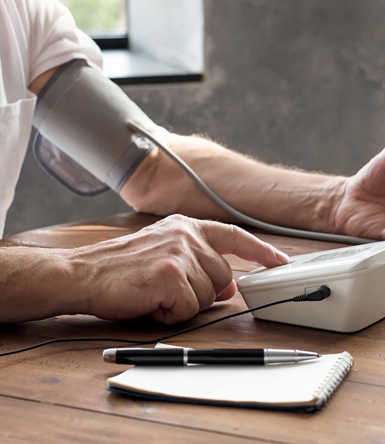 Man monitoring blood pressure