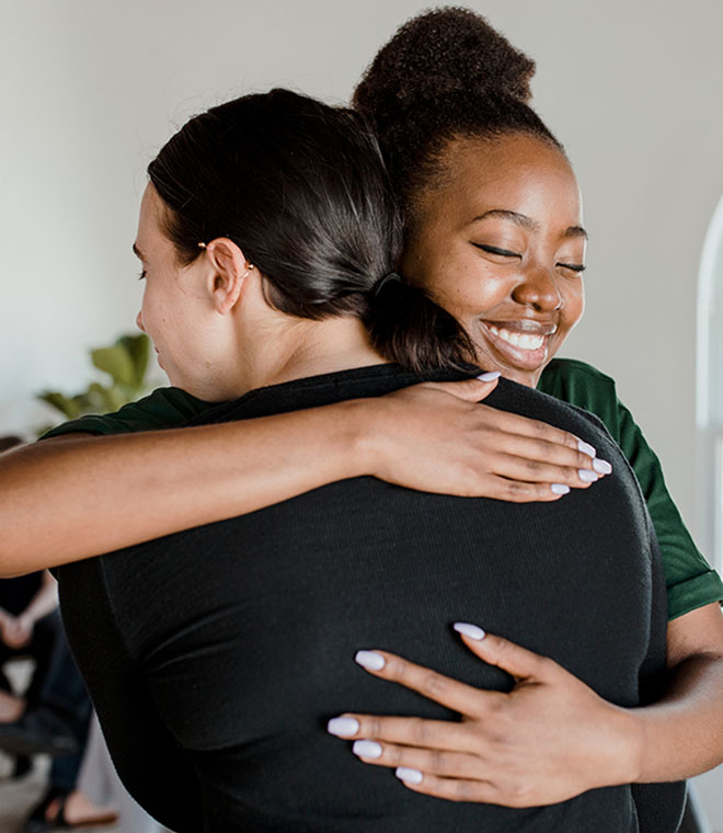 Two people hugging