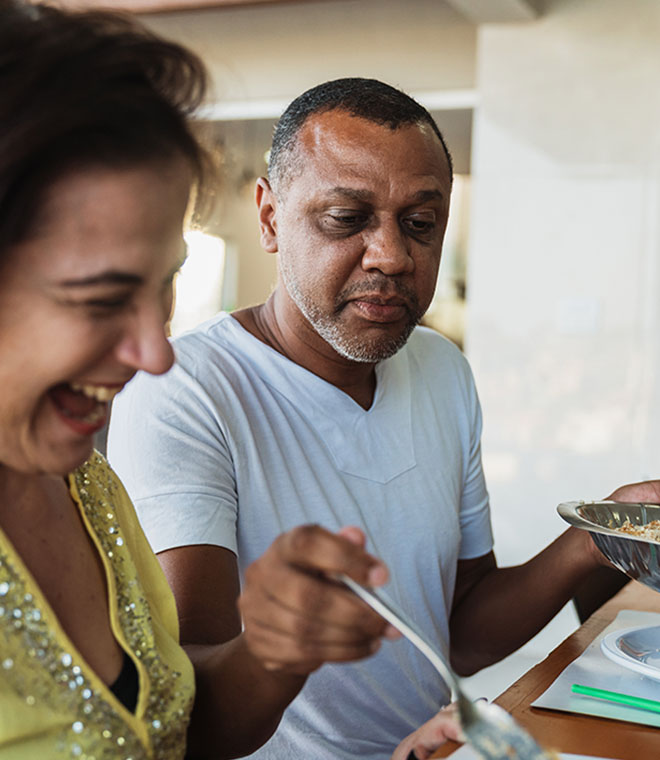 Man and woman enjoying a meal together