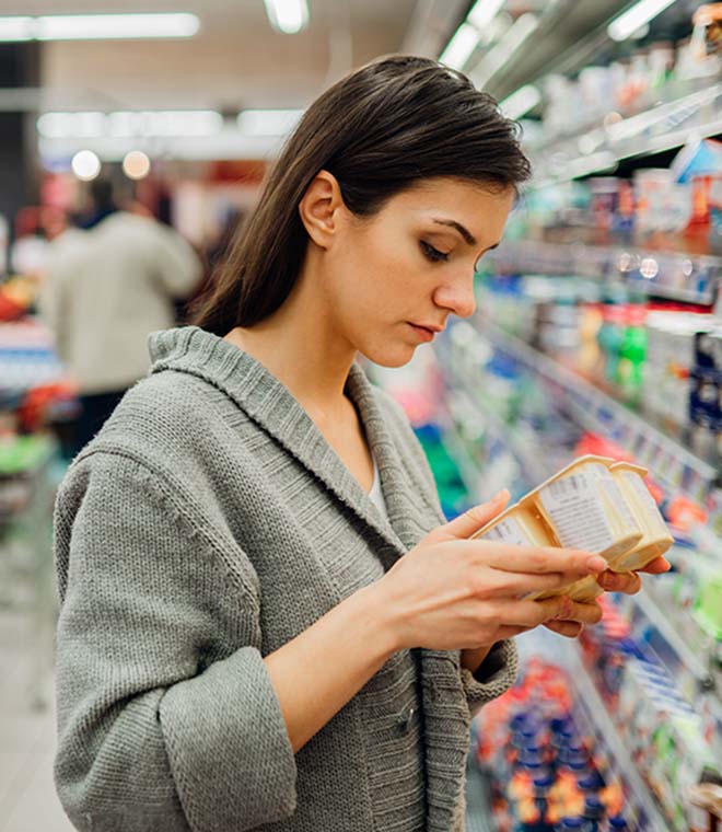 Young woman shopping in a grocery store