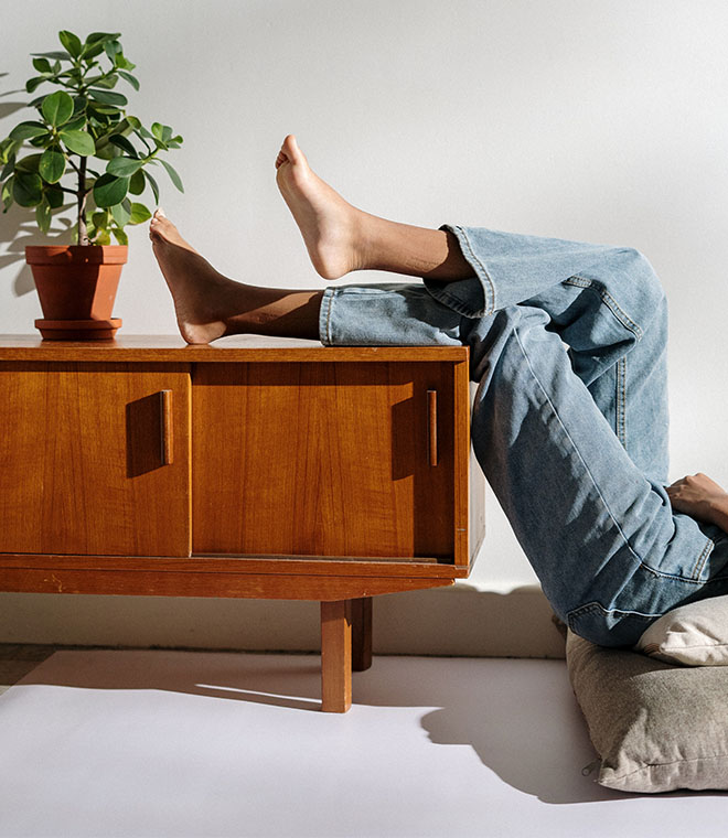 Feet on an entertainment stand