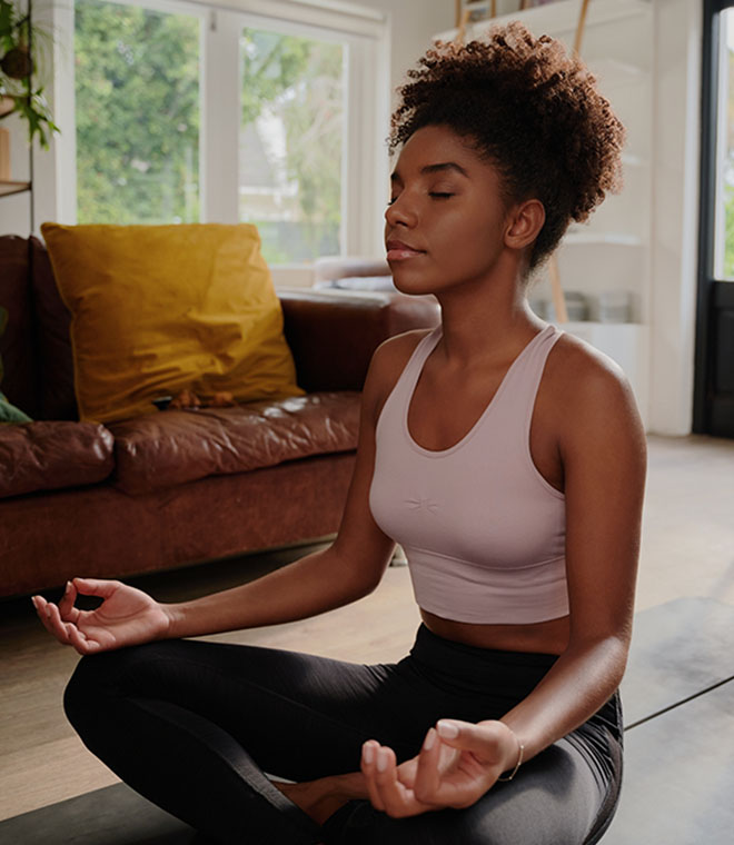 Young black woman meditating